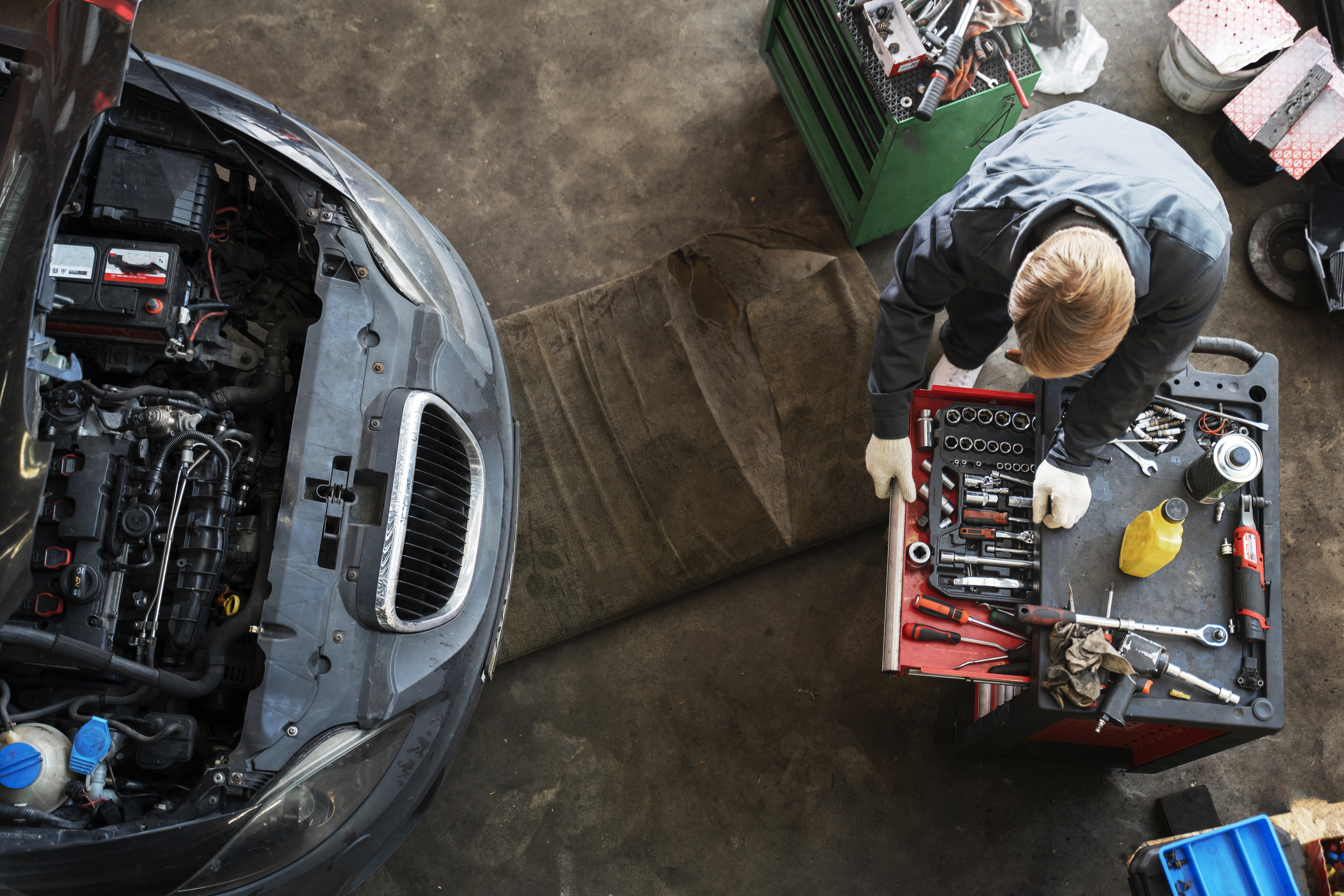 Mechanic Working on Car